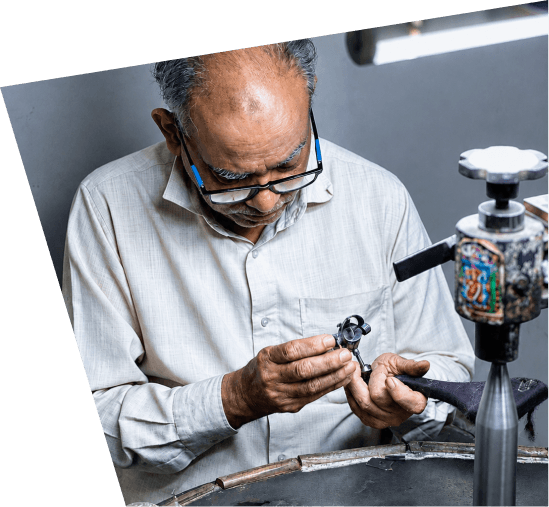 Bench worker polishing a diamond